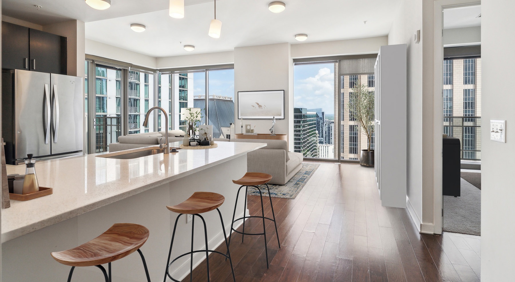 room with large island and stools