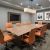 a conference room with a table and chairs