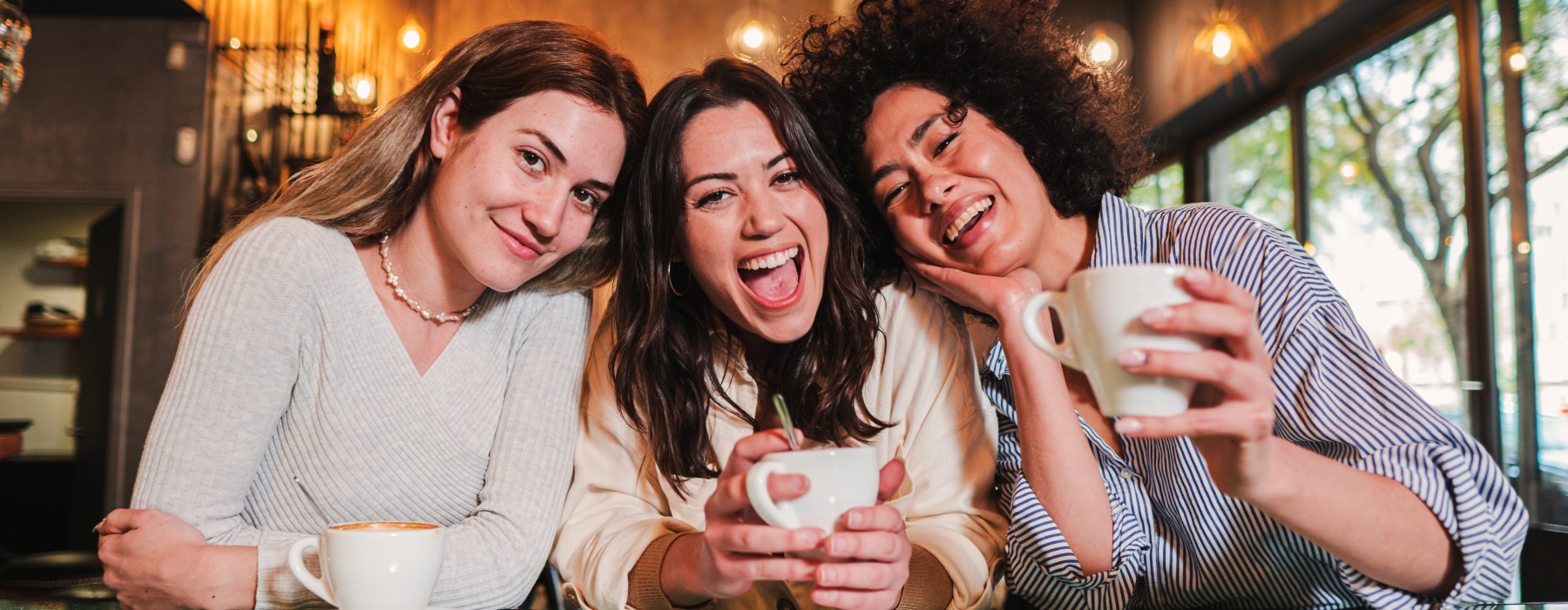 Women enjoying coffee in a coffee shop near Atlantic House