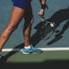 woman playing tennis