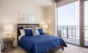 Large Bedroom with Balcony Access at Atlantic House Luxury High Rise Apartments in Midtown Atlanta