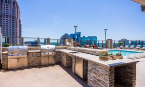 Outdoor kitchen by the Rooftop Pool of Atlantic House Luxury High Rise Apartments in Midtown Atlanta